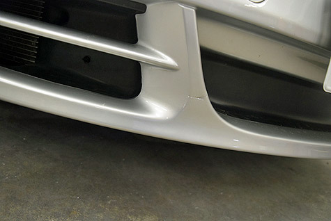 �|���V�F�911��J����S (997)�̑O�o���p�[�̏�